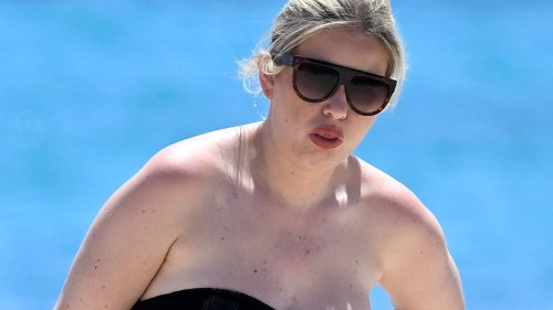 Love Island’s Amy Hart looks amazing in strapless swimsuit as she hits the beach on family holiday