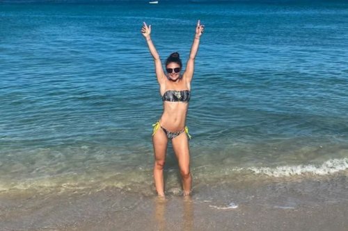 Megan Nicholls frolics in a bikini in Barbados as she celebrates retiring at 25