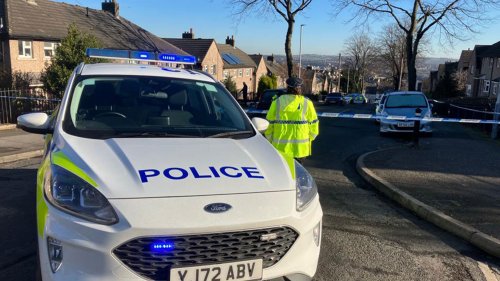 Four injured and rushed to hospital in major incident at house in Huddersfield as cops seal off road