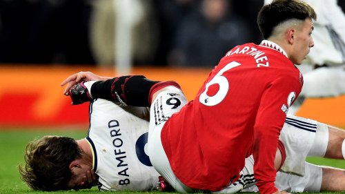Fans furious as Man Utd star Lisandro Martinez scrapes studs down Patrick Bamford’s FACE.. but somehow gets away with it