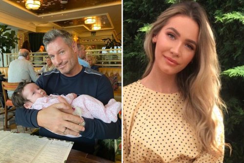 Proud Dean Gaffney, 43, poses with newborn granddaughter