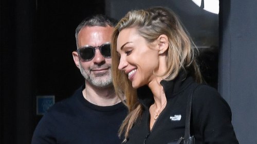 Ryan Giggs heads out for a haircut while girlfriend Zara Charles waits outside for Man Utd legend