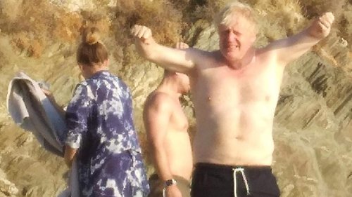 Boris Johnson stretches out on sun-kissed sands of Greek isle – just a week after Slovenia spa break