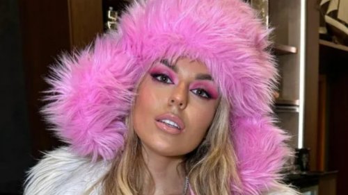 Tallia Storm Leaves Nothing To The Imagination As She Sizzles In Hot Pink Bikini And Fur Boots