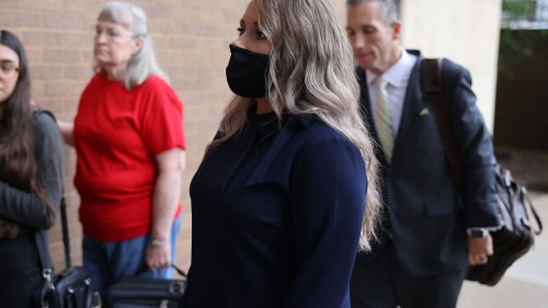 Josh Duggar’s rarely-seen wife Anna looks stoic as she arrives at court for his child pornography prison sentencing
