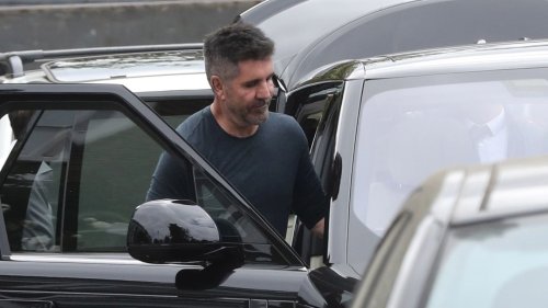 Petrolhead Simon Cowell spotted out and about as he goes green with £115,00 black electric Range Rover
