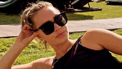 Laura Woods looks sensational in black bathing suit during ‘sexy anniversary getaway’