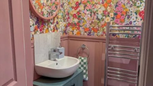 I gave my blank & boring loo a mega pink makeover for £300 – including posh wallpaper, panelling & new sink vanity unit