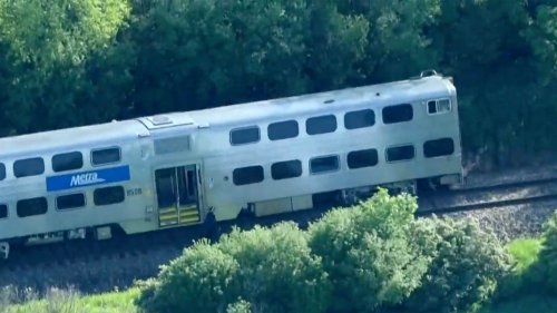 Truck driver killed and passenger injured after horror crash that derailed Metra train during morning rush hour