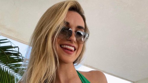 Kayla Simmons shares cheeky pic of her ‘boys’ as sexiest volleyball star celebrates stunning Instagram milestone