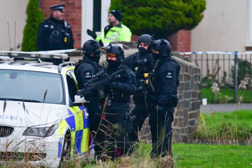 Armed cops in standoff with man in home as residents EVACUATED from homes