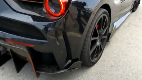 Man Utd and Chelsea target Aubameyang refuses to address transfer future after finding flat tyre on £260k Ferrari