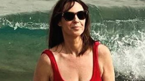 ‘Look at her Baywatch body!’ gush The One Show fans as Alex Jones, 47, strips to red swimsuit for sizzling beach snap