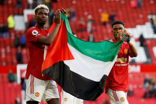 Paul Pogba and Amad Diallo hold Palestine flag after Man U ...