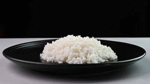 Stop Throwing Out Leftover Rice, Toss It In The Oven Instead