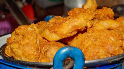 The Underrated Fat That Makes For Unbeatable Fried Chicken