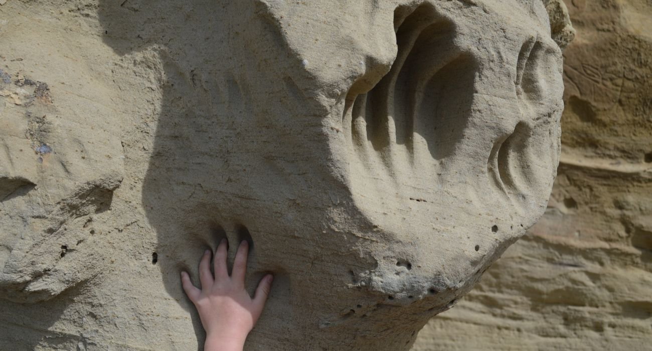 Who Carved These Ancient Giant Handprints Petroglyphs In Wyoming?