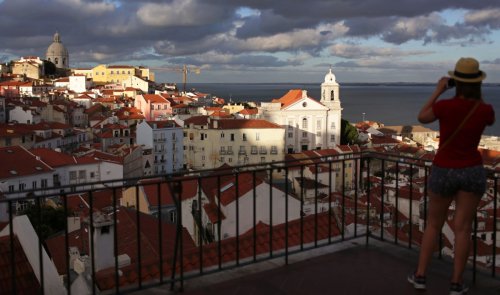 Portugal’s golden visa program sparked an investment boom. But locals say they’re getting priced out.