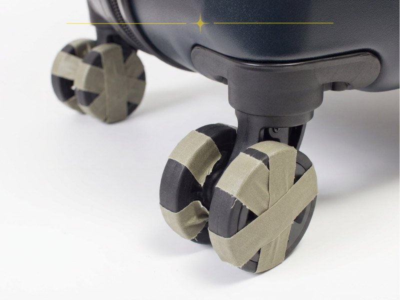 Why More and More Travelers Are Putting Tape On Suitcase Wheels? - The World in My Pocket