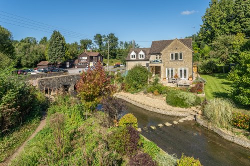 A riverside home located on the edge of the Cotswold Area of Outstanding Natural Beauty where the River Avon flows through the garden - Country Life
