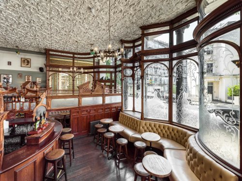 Four London pubs have been listed for their awesome interiors