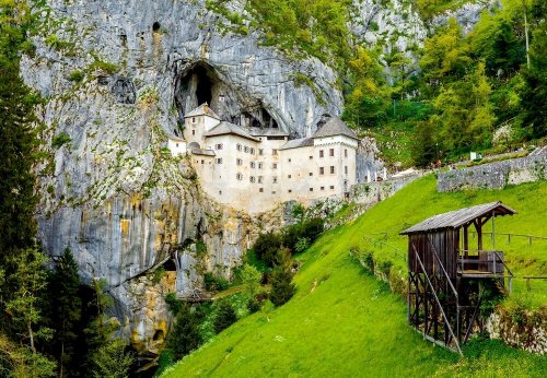 This beautiful cave castle in Slovenia is straight out of a Studio Ghibli movie