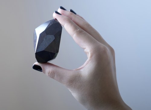 Likely extraterrestrial 555.55-carat black diamond unveiled in Dubai
