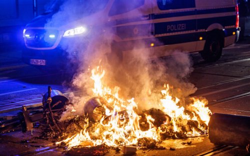 Protesters clash with German police over jailing of activists who attacked neo-Nazis
