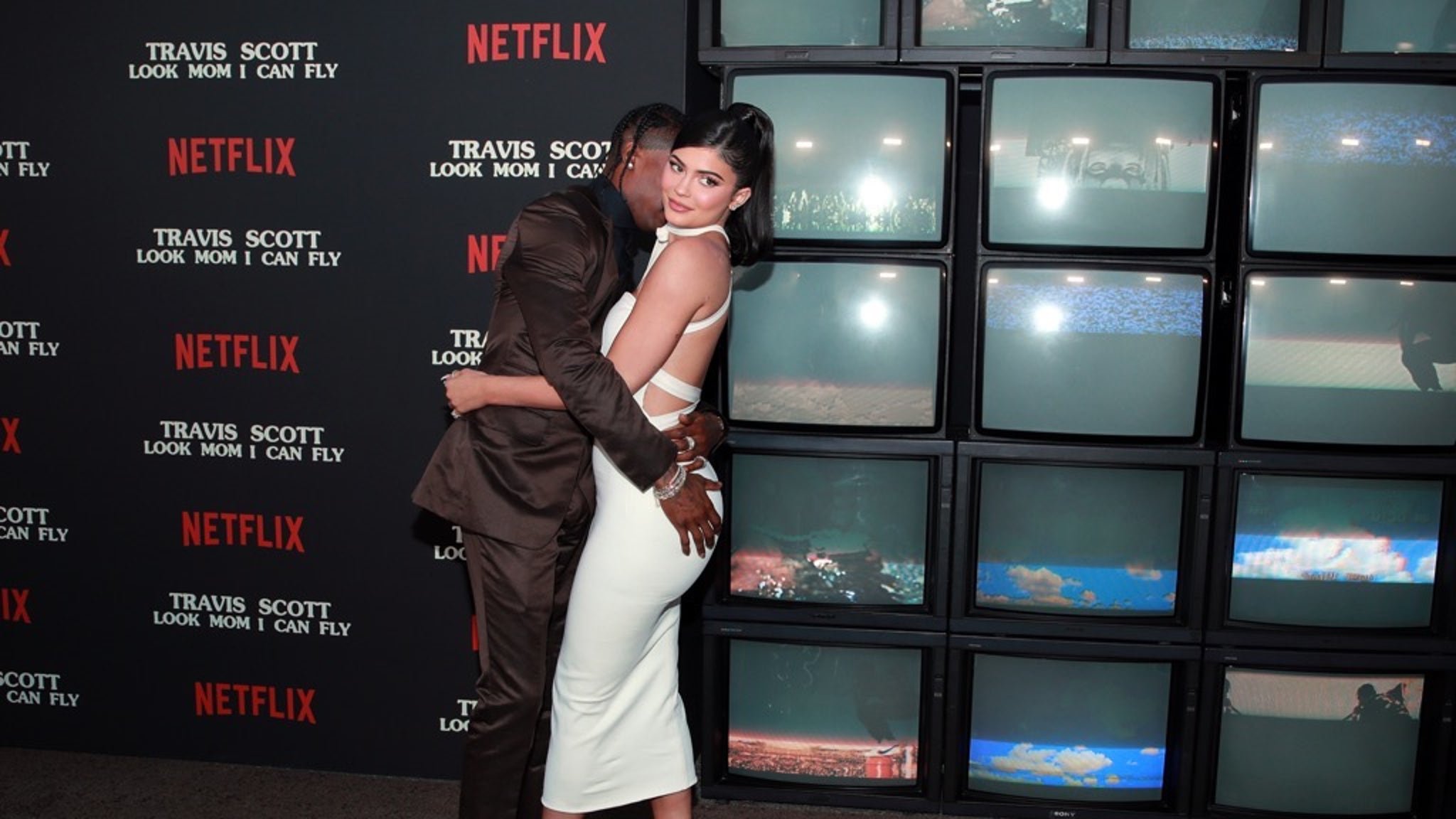 Travis Scott Grabs Kylie's Attention At Netflix Premiere