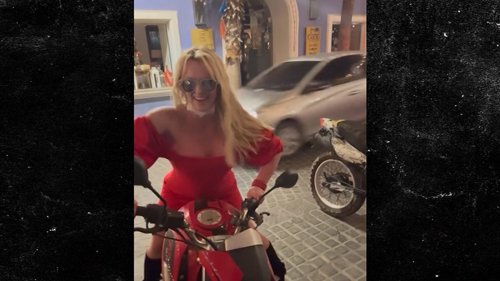 Britney Spears Fast, Furious & Fabulous ... Hops on Motorcycle in Fiery Red Dress