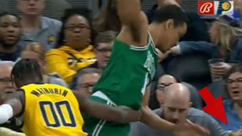 NBA's Malcolm Brogdon Falls Into Fan Sitting Courtside ... Beer Spills ...