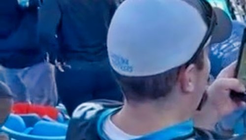 Panthers Fan Got Caught In 4K Using Binoculars On Phone To Record Cheerleaders (VIDEO)