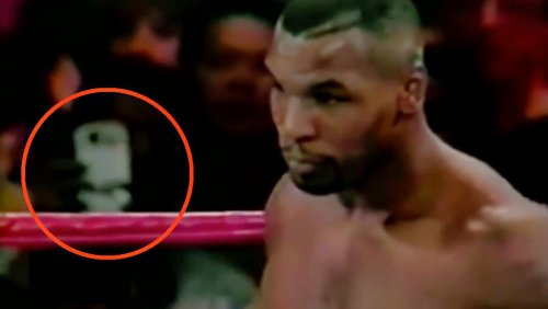 LOOK: Social Media Thinks They’ve Spotted A Time Traveler At Mike Tyson’s 1995 Boxing Match Against Peter McNeeley (PIC + VIDEO)