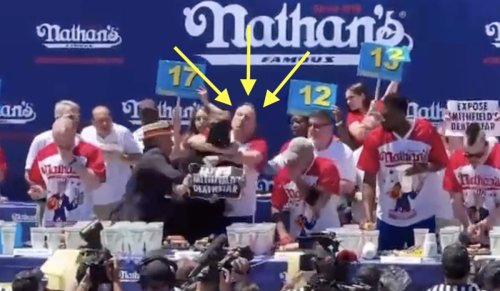 Joey Chestnut Puts Protestor In Chokehold During Nathan's Hot Dog Eating Contest, Still Wins By Eating 63 Dogs (VIDEO)