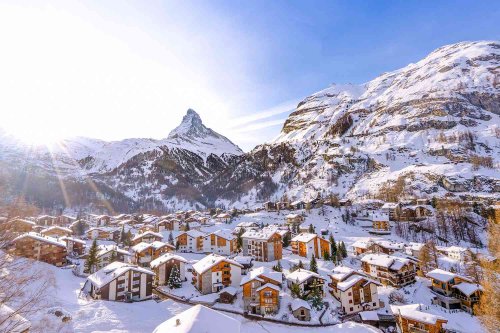 This Stunning Swiss Town Has Cozy Chalets, Epic Skiing, and One of the Highest Mountains in Europe