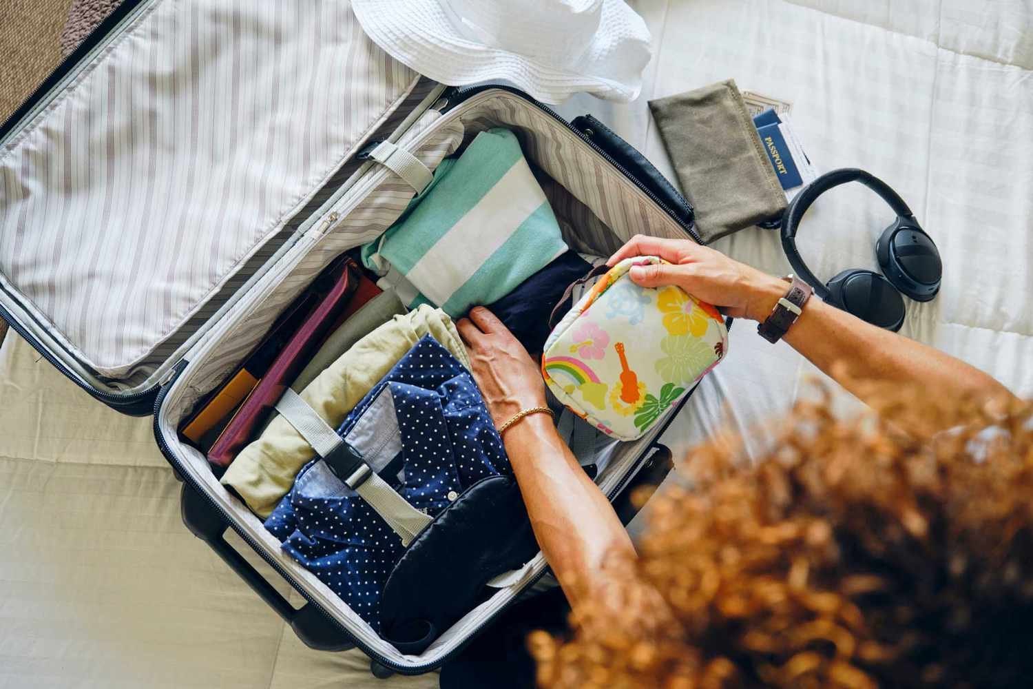 Genius Packing Hacks to Save Space in Your Suitcase  - cover