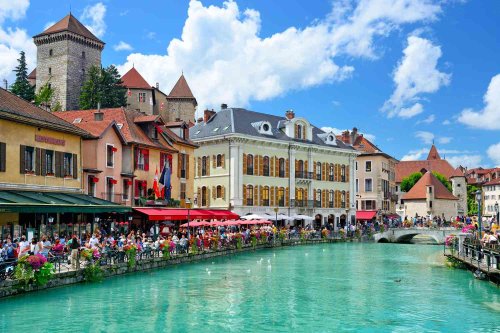 This French Town is Known as the ‘Venice of the Alps’ With Canals, Gourmet Restaurants, and a Medieval Château
