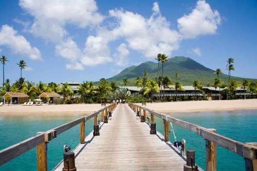 This Small Caribbean Island Has White-sand Beaches, a Volcanic Mountain, and Gorgeous Luxury Resorts