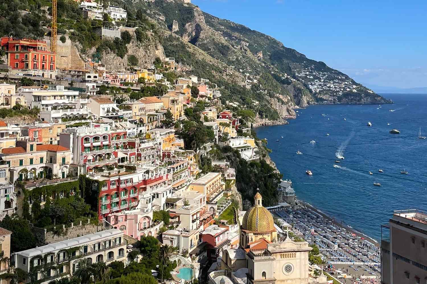 This Cliffside Italian Village Was Named the Happiest Place to Travel in Europe—and It Has Colorful Houses and Pebble Be