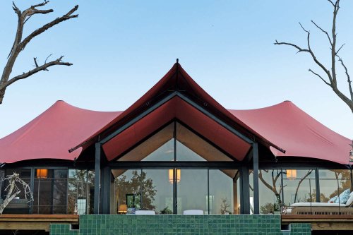 One of the World's Most Famous National Parks Just Got a Brand-new Lodge With Bright-pink Glamping Tents