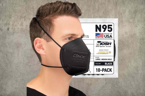 Why You'll See More Face Masks on Flights This Spring—and If You Should Be Wearing 1 Too, According to Doctors