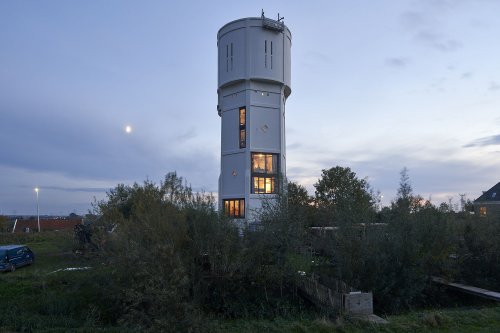 Century-Old Water Tower Is Transformed Into 2 Family Homes