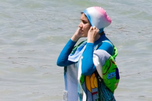 French city votes to allow Muslim women to swim in burka-bikini suits