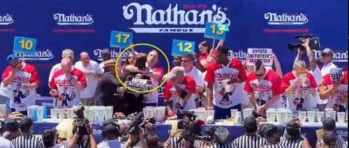 Joey Chestnut Put A Protester In A Chokehold While Winning His 15th Nathan’s Hot Dog Eating Contest