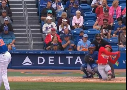 Oscar Mercado was fooled so bad by a pitch that he fell down mid-check swing