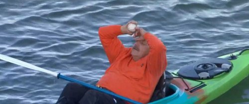 The Giants fan in a kayak who caught the 100th splash hit into McCovey Cove was so emotional