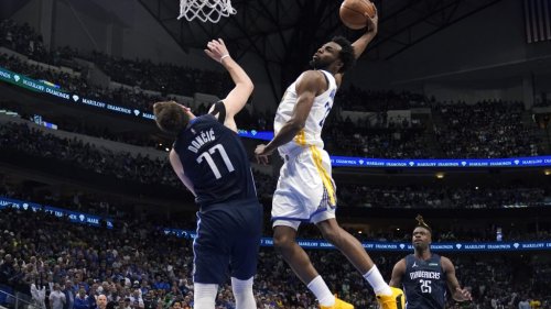 See every angle, incredible photos of Andrew Wiggins' filthy posterizing dunk over Luka Doncic