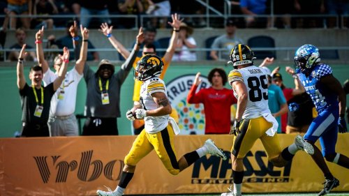 Where will the Iowa Hawkeyes finish according to the Athletic's Big Ten fans survey?