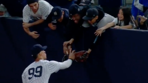 MLB fans weren't happy after a Yankees fan took a baseball from Aaron Judge out of a young kid's glove