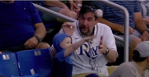 A little kid threw back a foul ball at the Blue Jays-Rays game and his dad had the best reaction